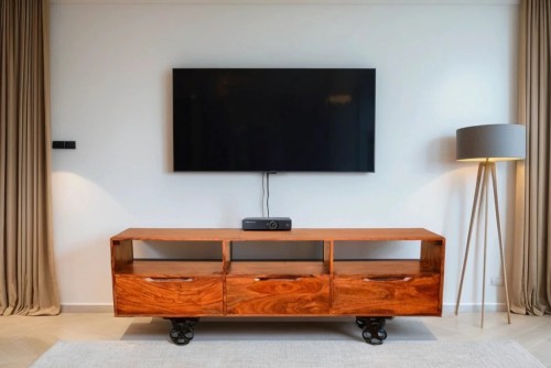 Bizarre iron wheel leg tv unit