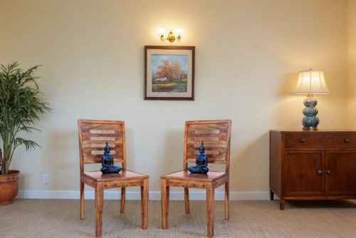 Pair of Capsule curved natural finish chair
