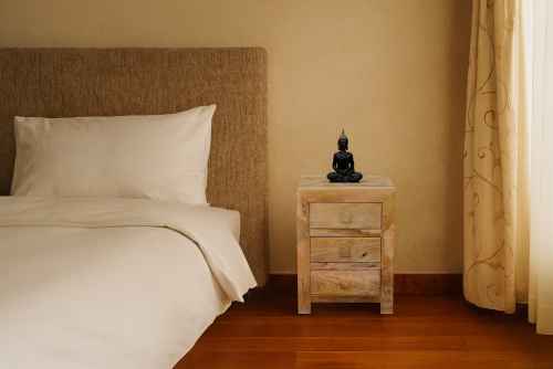 Oblong three drawer bedside
